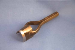 STRAP END PUNCH